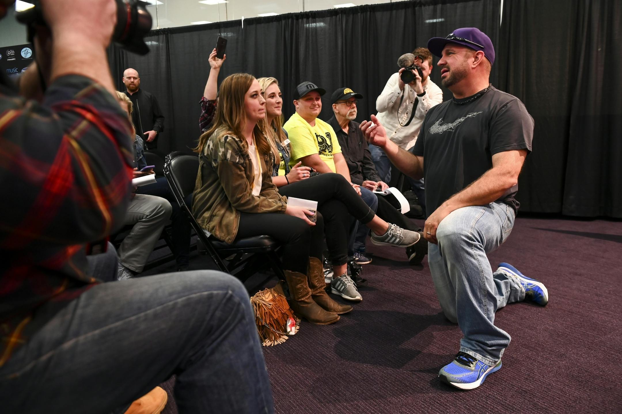 Garth Brooks chatted with members of country music radio media before holding one-on-one interviews Friday at US Bank Stadium.