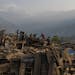 Villagers search rubble for usable items in Barpak, a village at the epicenter of the earthquake where more than 1,200 houses were destroyed or damage
