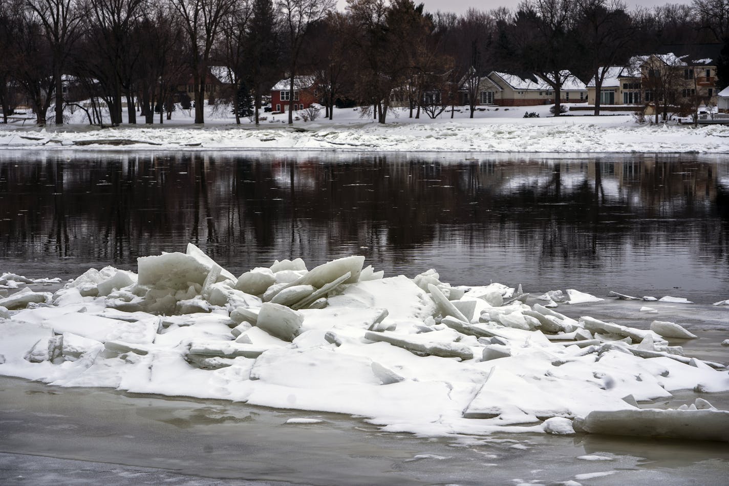 The Mississippi River near the Hwy 169 bridge in Champlin has been in and out of flooding for weeks. The Army Corps is warning cities along the Mississippi River from Winona to Iowa because of ice dams building up and forcing water out of its normal flow.] .RICHARD TSONG-TAATARII &#xa5; richard.tsong-taatarii@startribune.com