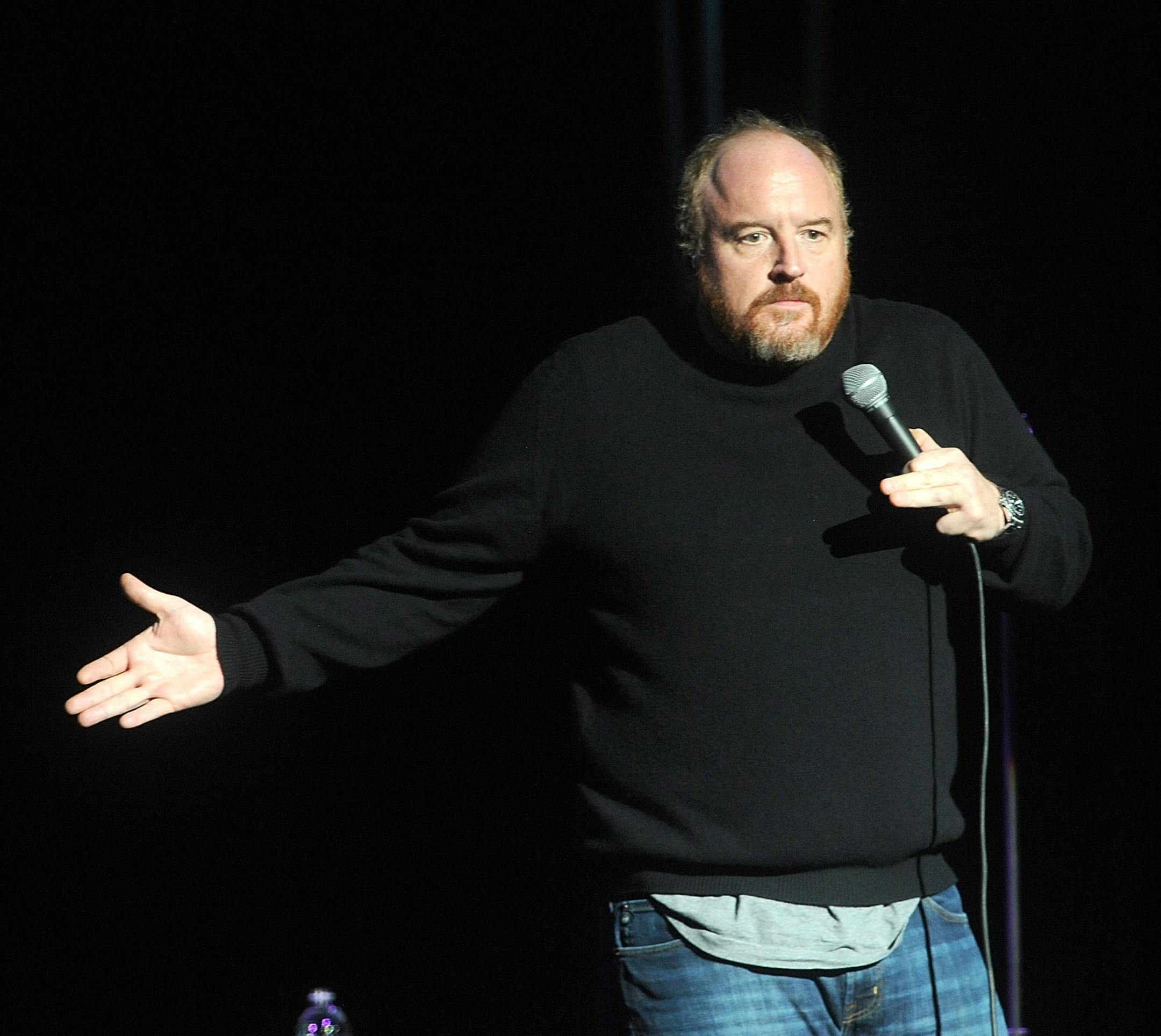 FILE - In this Nov. 5, 2014 file photo, Louis C.K. performs at the 8th Annual Stand Up For Heroes, presented by New York Comedy Festival and The Bob Woodruff Foundation, at the Theater at Madison Square Garden in New York. Louis C.K.ís comedy show in New York was canceled because of the weather. The comedian-actor sent an email to ticketholders expecting to see his Madison Square Garden show Tuesday, poking fun at the hysteria surrounding the snowstorm hitting the Northeast. (Photo by Brad