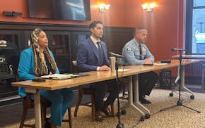 From left, Minneapolis Department of Civil Rights Director Michelle Phillips, Deputy Community Safety Commissioner Jared Jeffries and Police Chief Bri