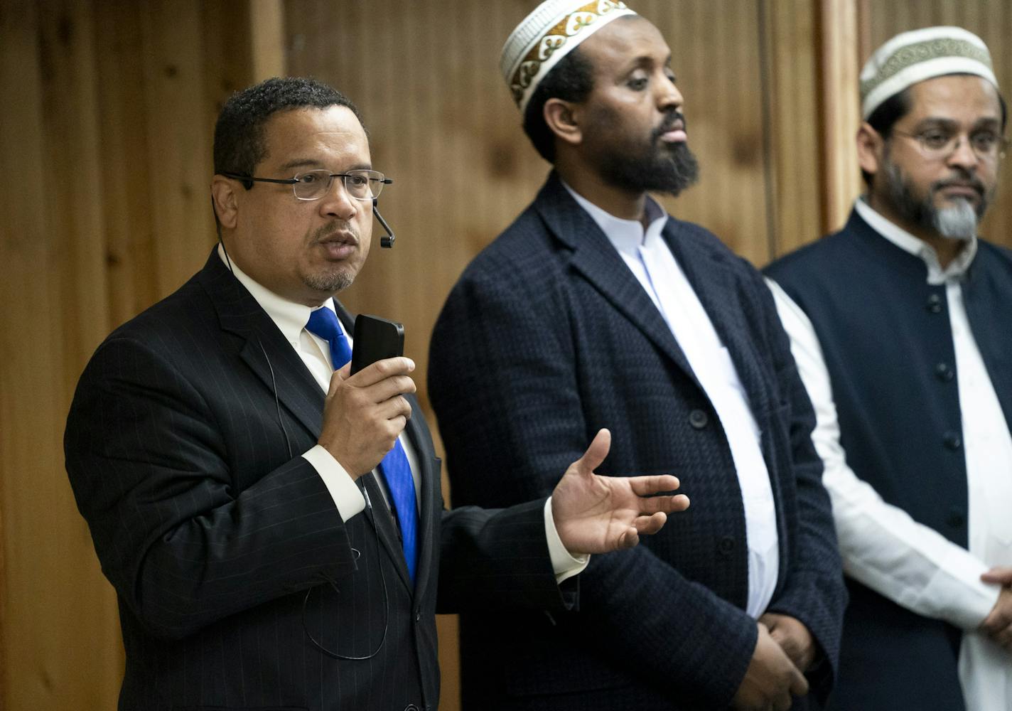 Attorney General Keith Ellison spoke at the end Friday prayer at Dar Al-Farooq Islamic Center in Bloomington, Minn., on Friday, March 15, 2019. He was encouraging Muslims to to no be afraid to be part of the community after the New Zealand mosque attacks. At right is Dar Al-Farooq executive director Mohammed Omar (center) and guest speaker Imam Asad Zaman. ] RENEE JONES SCHNEIDER ¥ renee.jones@startribune.com