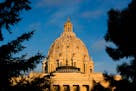 The Minnesota State Capitol was bathed in warm evening light as the sun went down on the first day of the legislative session. ] GLEN STUBBE &#x2022; 