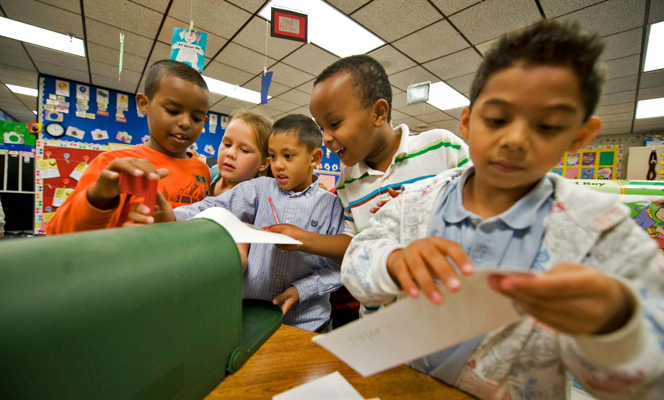First graders from teacher Staci Strowbridge's class "mailed" their penpal letters by putting them in the classroom "mailbox".