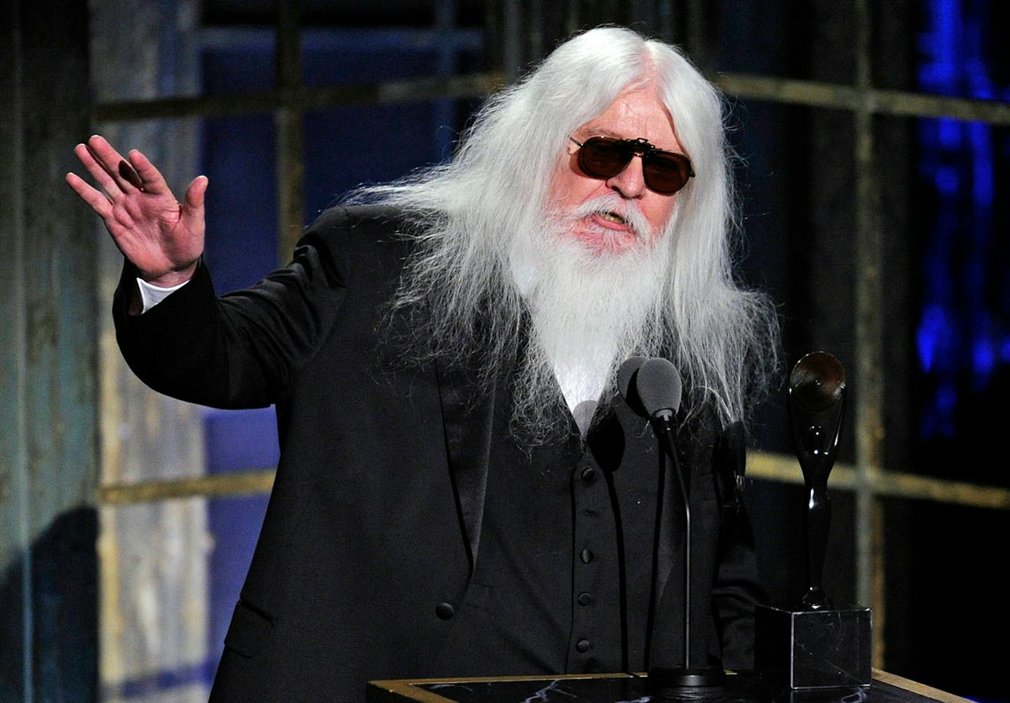 Inductee Leon Russell accepts his trophy at the Rock and Roll Hall of Fame induction ceremony, Monday, March 14, 2011, in New York.