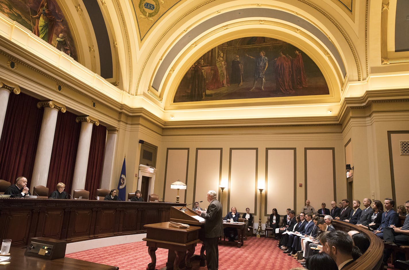 Sam Hanson, the attorney representing Gov. Mark Dayton, delivers his oral arguments before the Minnesota Supreme Court at the Capitol in St. Paul, Minn., Monday, Aug. 28, 2017, in the appeals case after the governor's attempt to eliminate funding for the Minnesota Legislature resulted in the Legislature suing him. (Leila Navidi/Star Tribune via AP) ORG XMIT: MIN2017082914125740 ORG XMIT: MIN1708291416263764