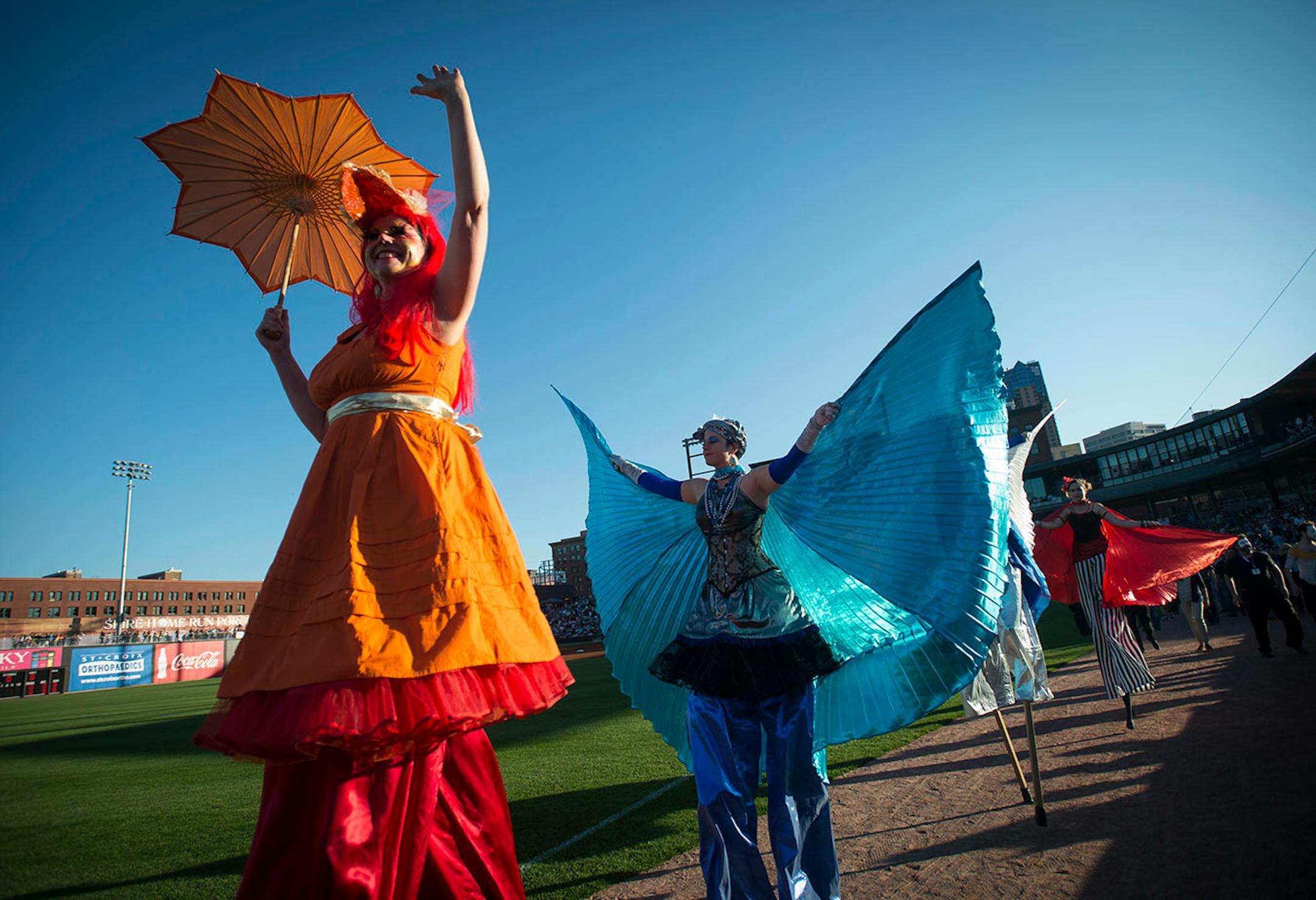 Members of the group, "Chicks on Sticks" made their way around CHS Field during a pre-game parade on Thursday night.