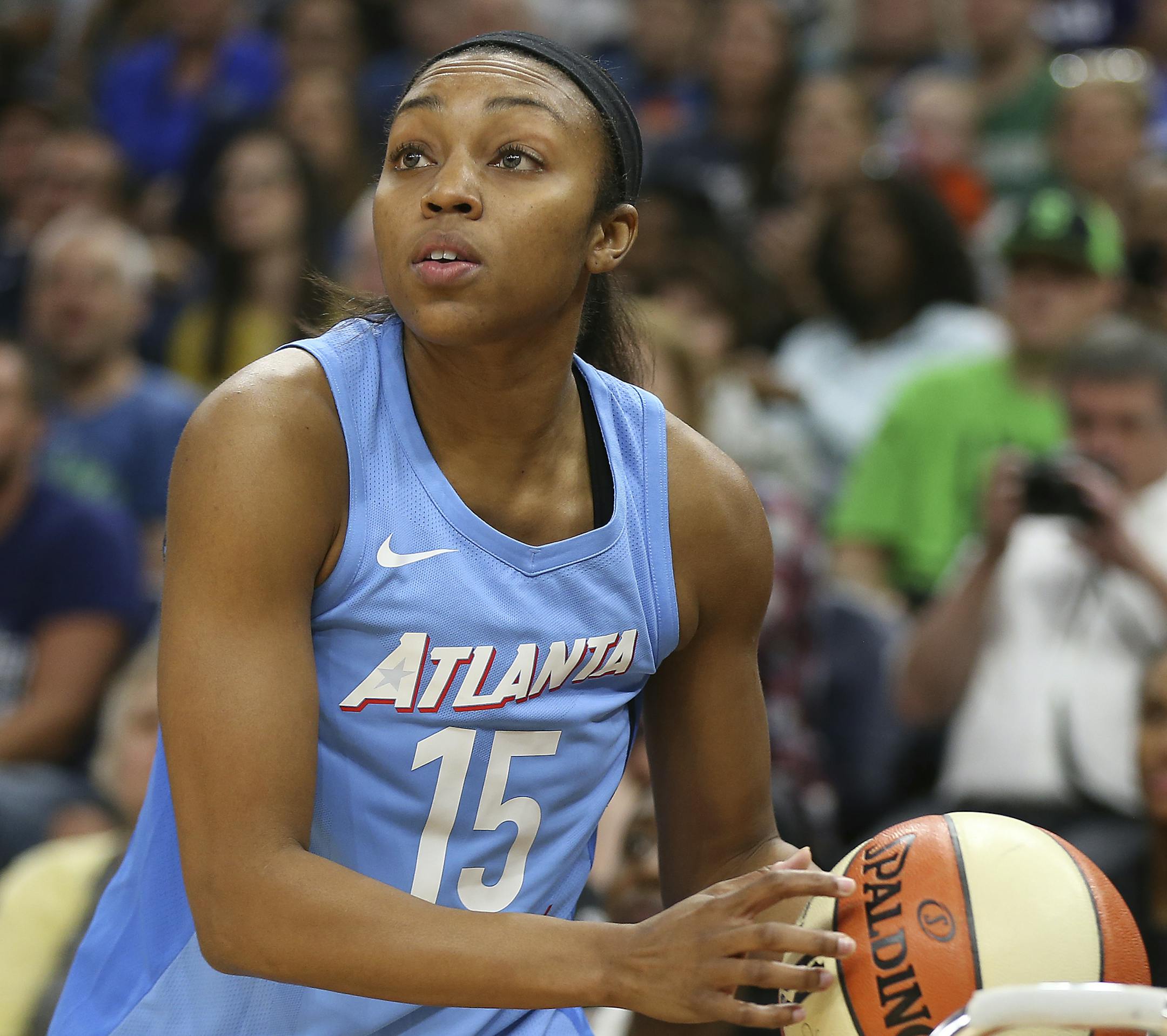 Atlanta Dream's Renee Montgomery looks to the basket at the start of the Three-Point Contest during halftime of the WNBA All-Star basketball game Saturday, July 28, 2018 in Minneapolis. (AP Photo/Stacy Bengs)
