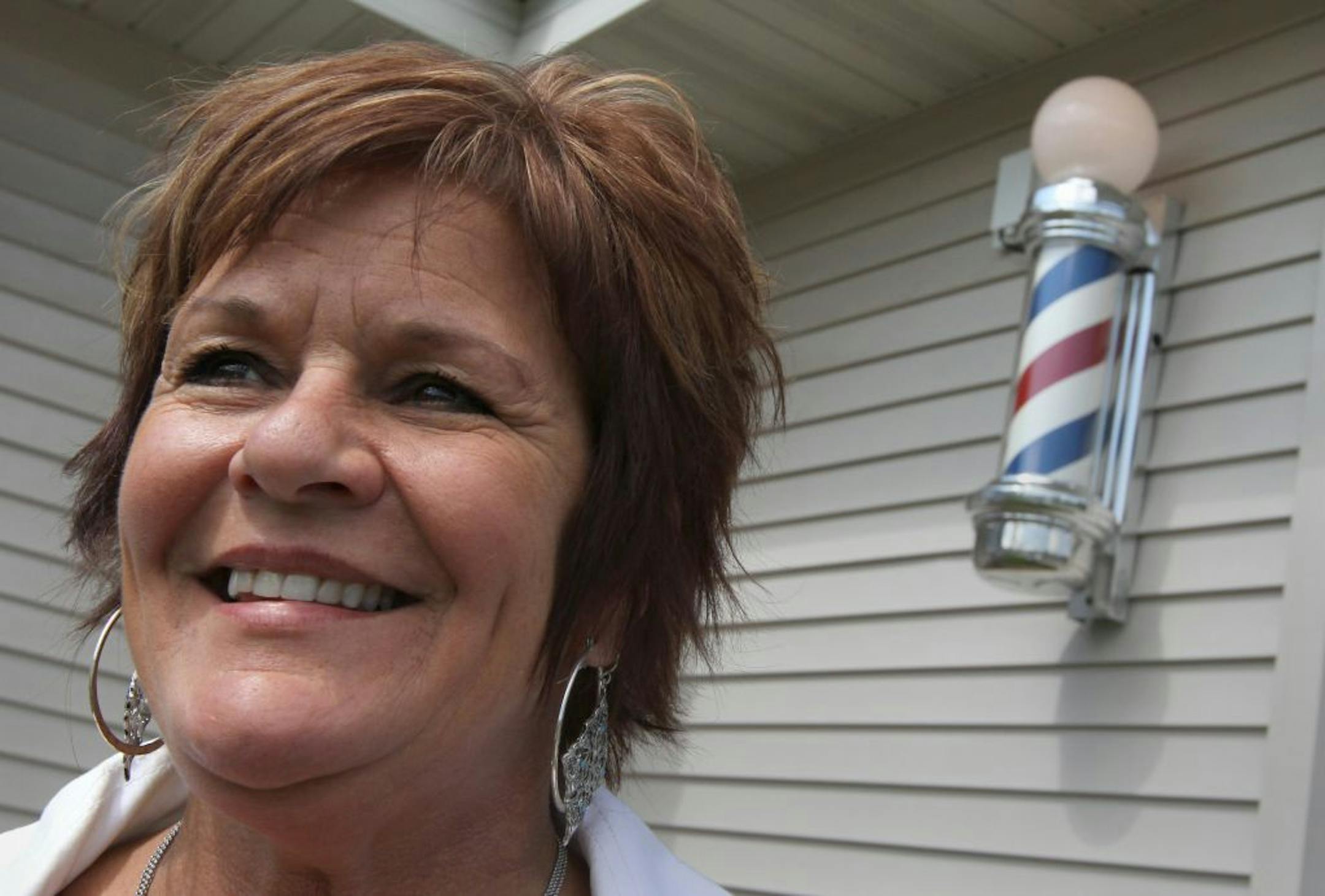 Barber Sandy Mielzarek's barber pole ran into a local ordinance on motion signs when she opened her Razor's Edge Barber Shop in Lakeland.