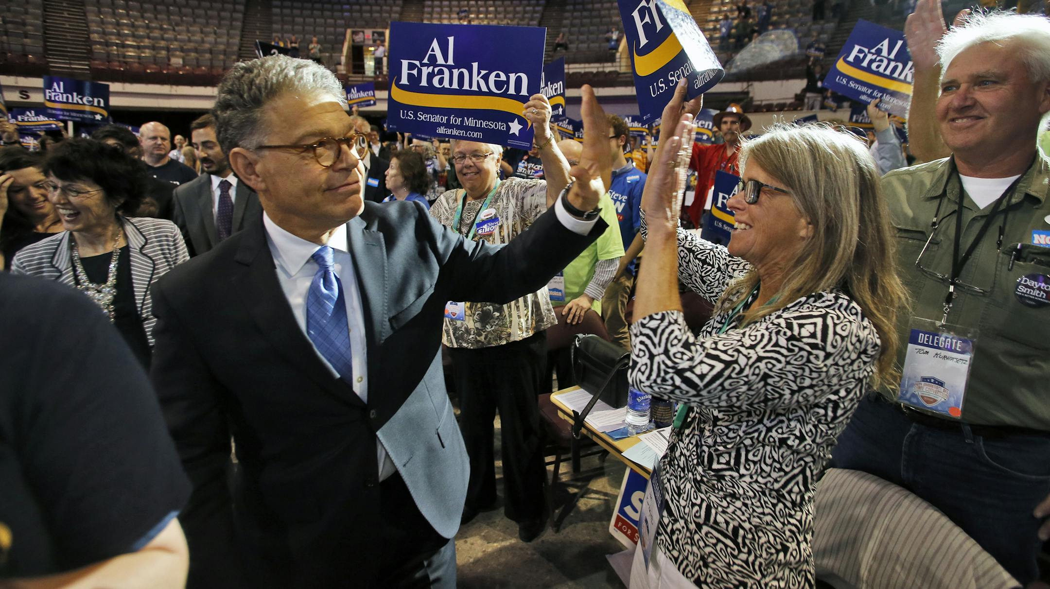 State Senator Al Franken heads to the stage to accept party endorsement. ] DFL state convention . (MARLIN LEVISON/STARTRIBUNE(mlevison@startribune.com) ORG XMIT: MIN1405311731590089