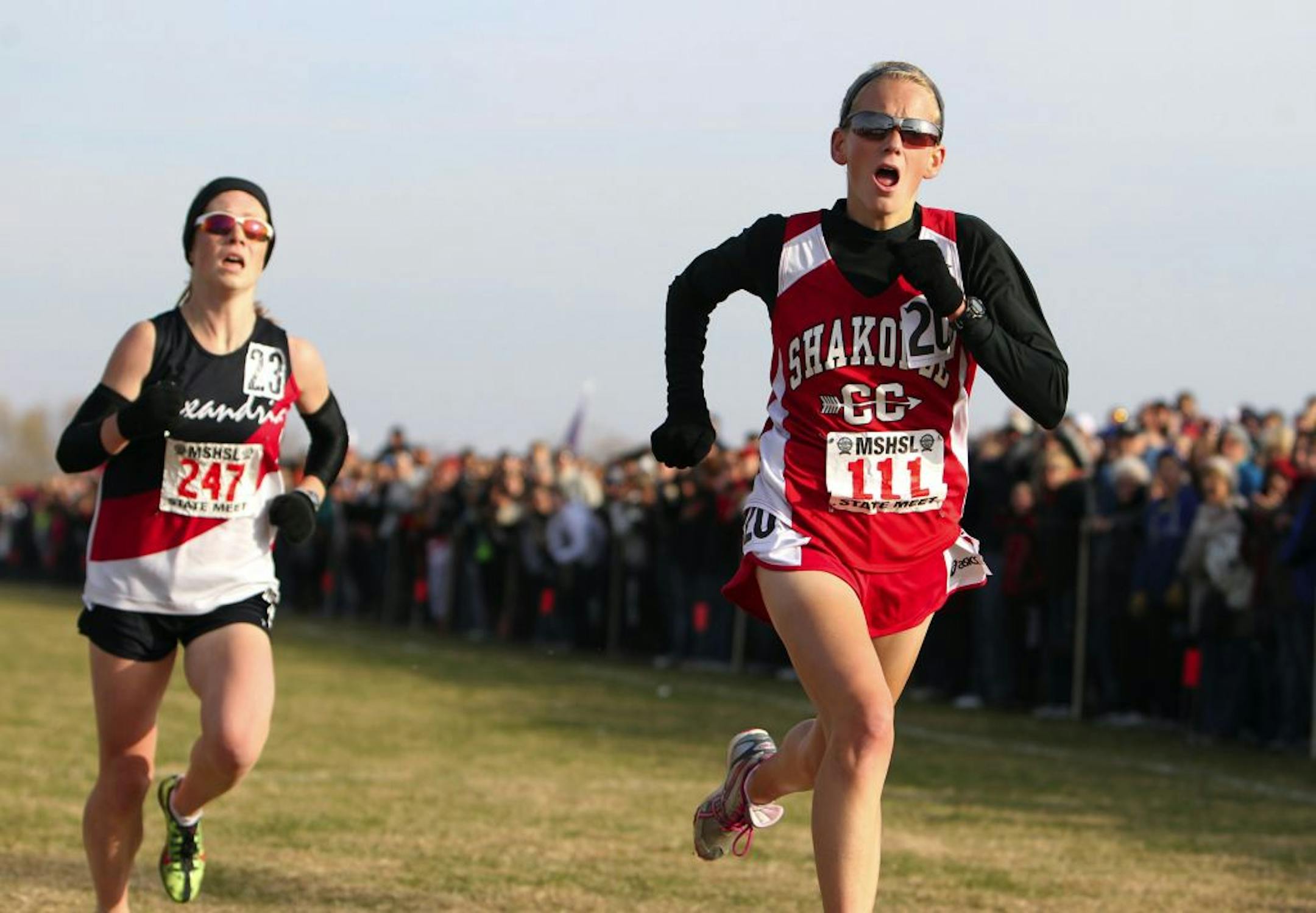 Shakopee's Maria Hauger, right, in 2011.