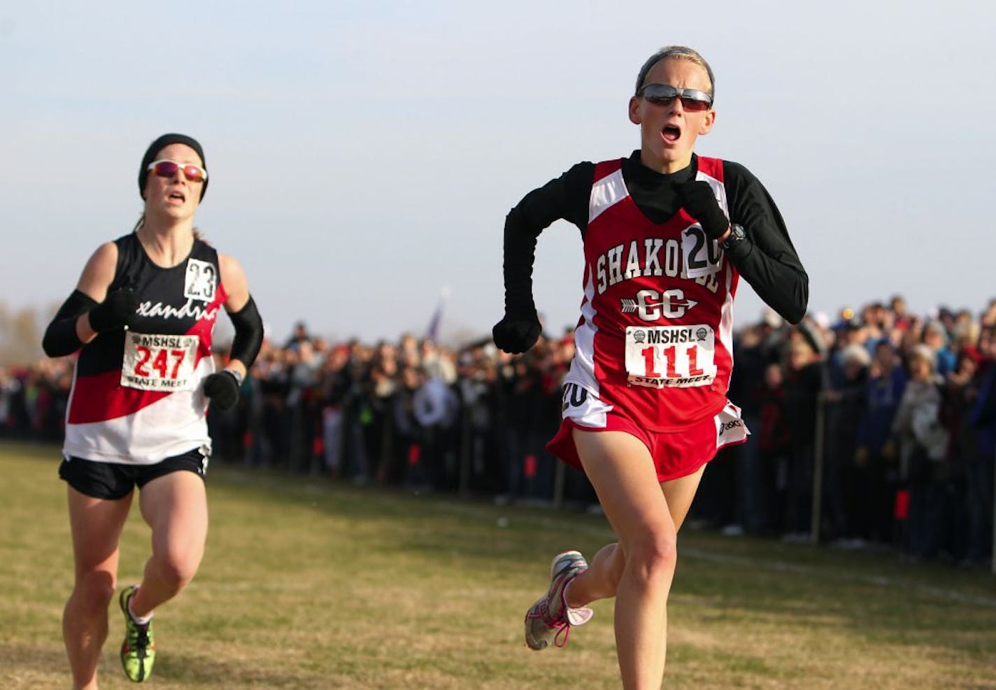 Shakopee's Maria Hauger, right, in 2011.