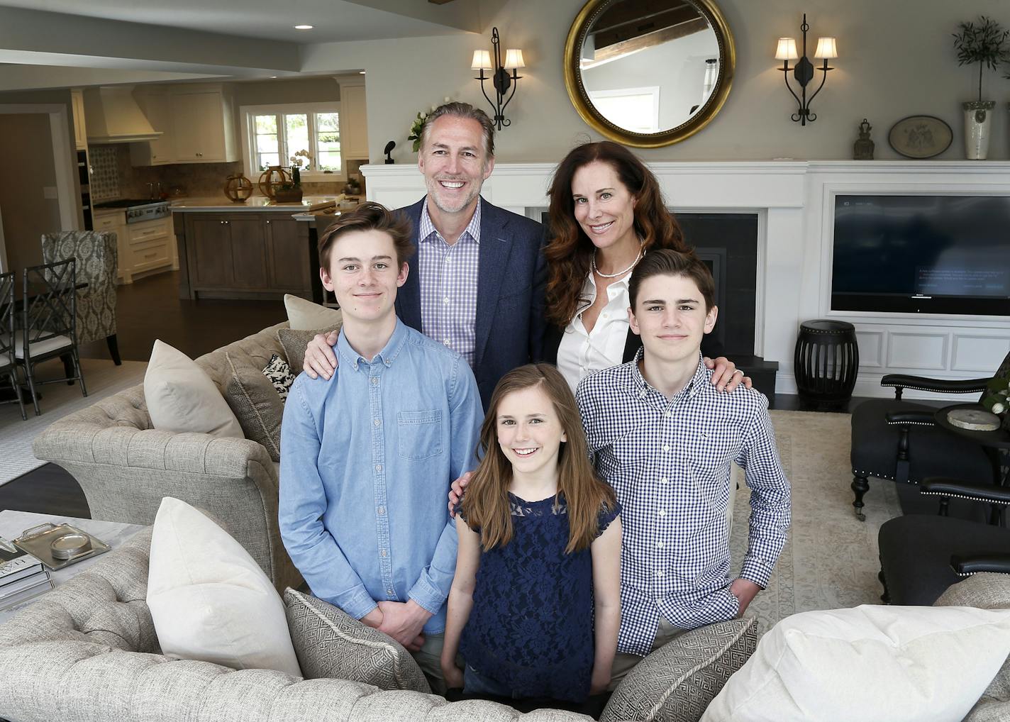 Homeowners Dario and Jeanne Anselmo, with their children Andrew, Ali and Aidan, gave 23 interior designers a blank canvas to turn their 1950s Edina rambler into a showcase home.