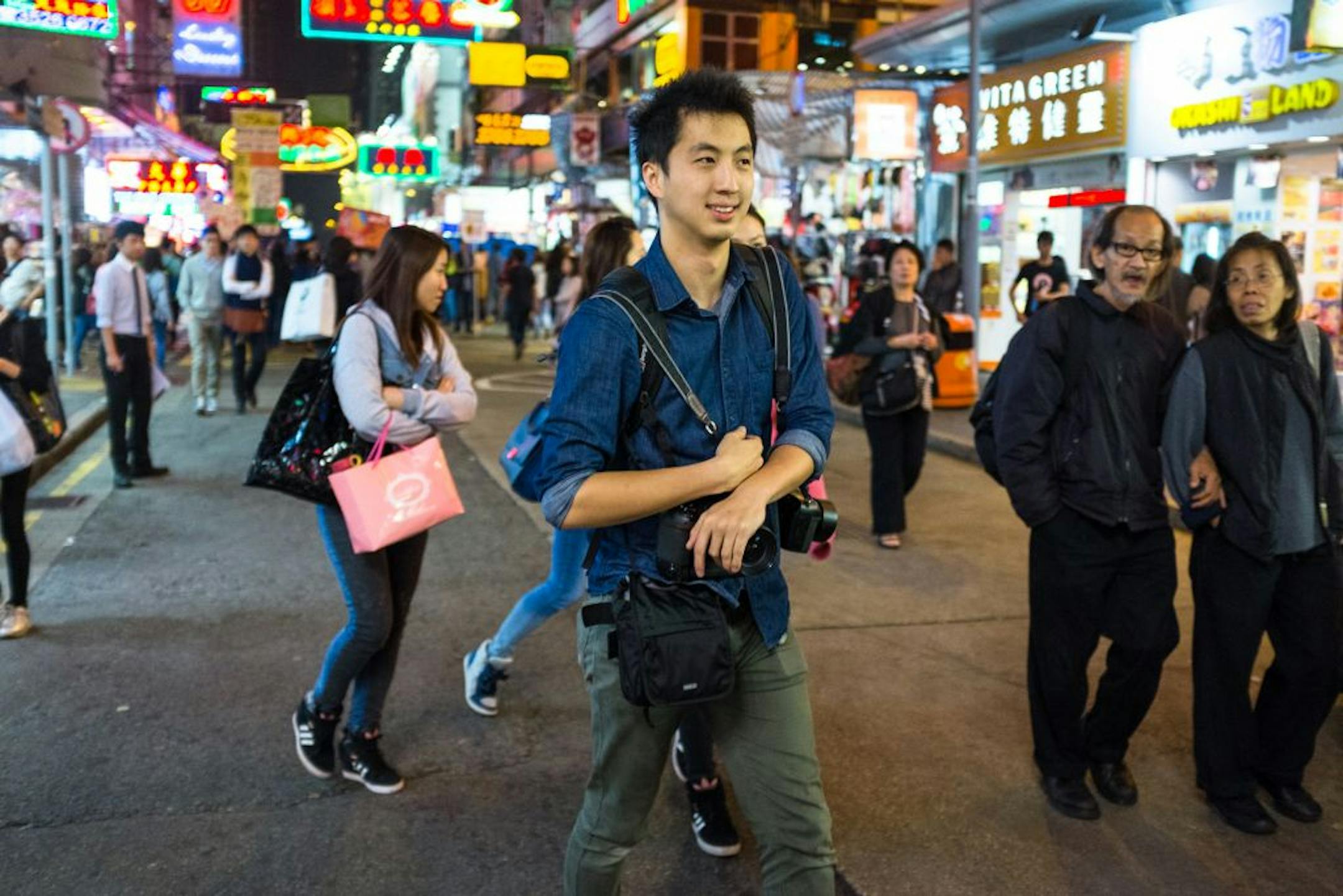 Kwan covered Hong Kong pro-democracy protests as demonstrators occupied several major commercial zones during the fall of 2014.