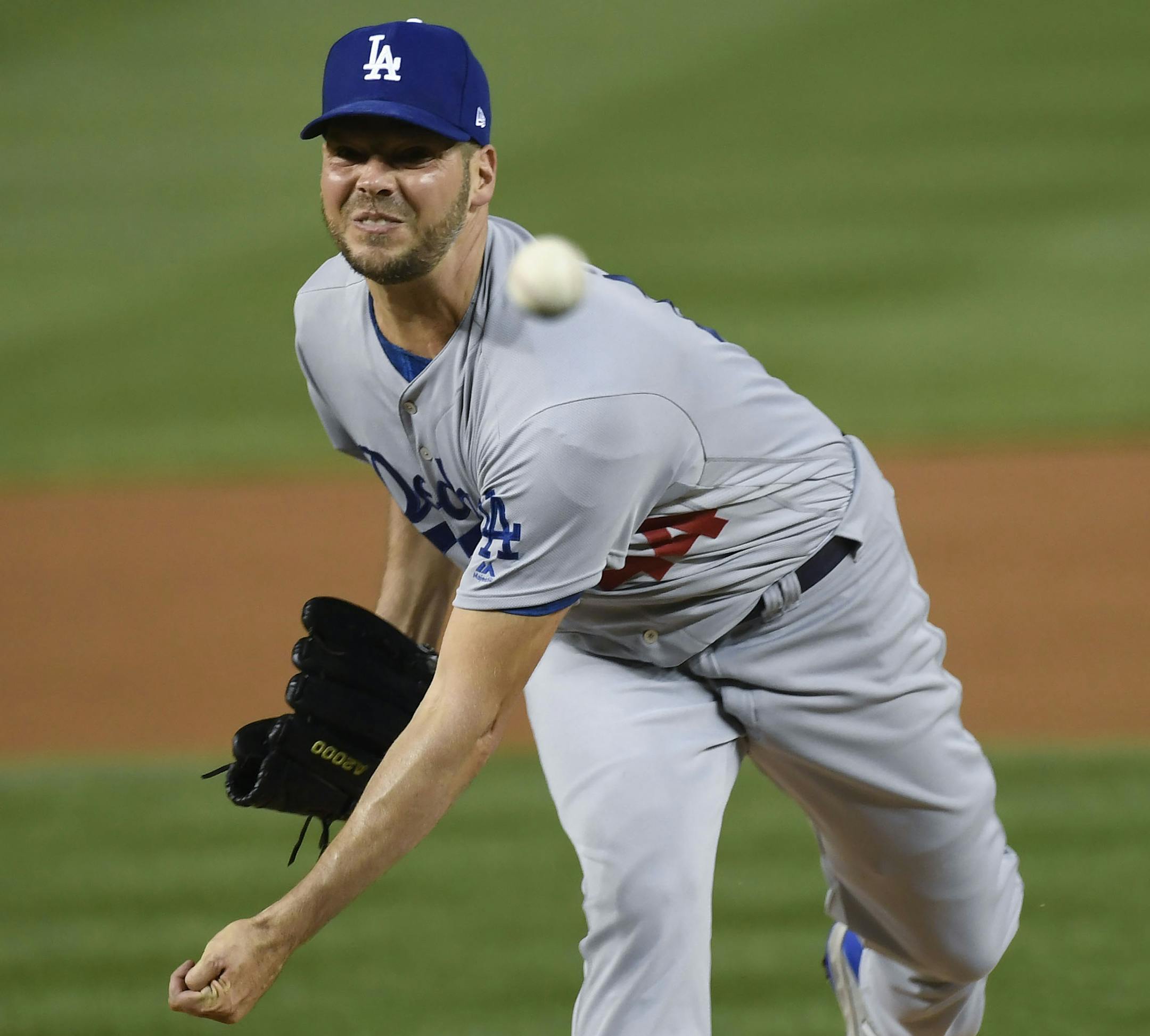 Los Angeles Dodgers starting pitcher Rich Hill throws against the Washington Nationals during the first inning in Game 4 of a baseball National League Division Series, Monday, Oct. 7, 2019, in Washington. (AP Photo/Susan Walsh) ORG XMIT: NAT127