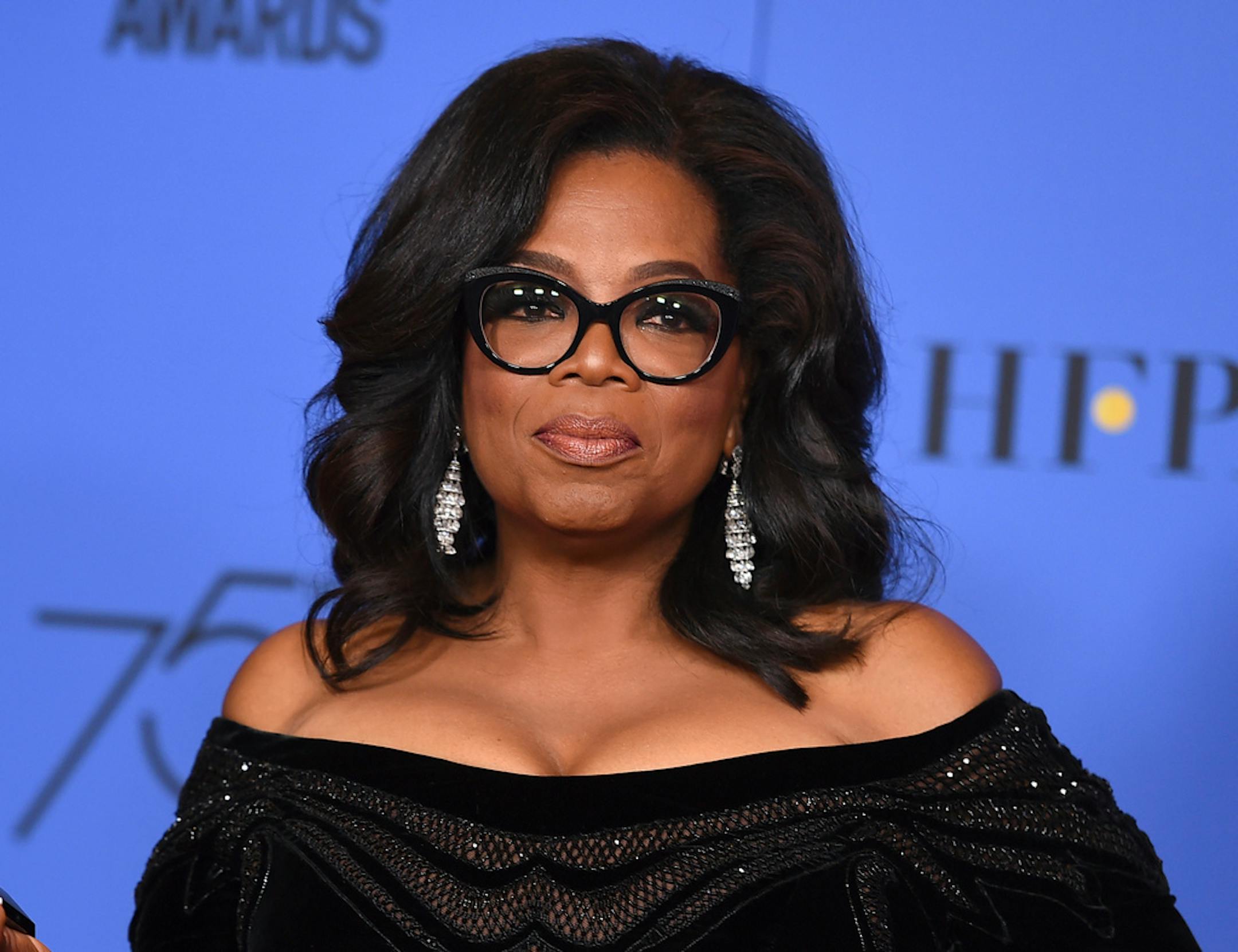 FILE - In this Jan. 7, 2018 file photo, Oprah Winfrey poses in the press room with the Cecil B. DeMille Award at the 75th annual Golden Globe Awards in Beverly Hills, Calif. Winfrey will interview two men who say Michael Jackson sexually abused them as boys immediately after a documentary on the men. HBO and the Oprah Winfrey Network announced Wednesday that "After Neverland," will air on both channels Monday at 10 p.m. Eastern and Pacific. (Photo by Jordan Strauss/Invision/AP, File)