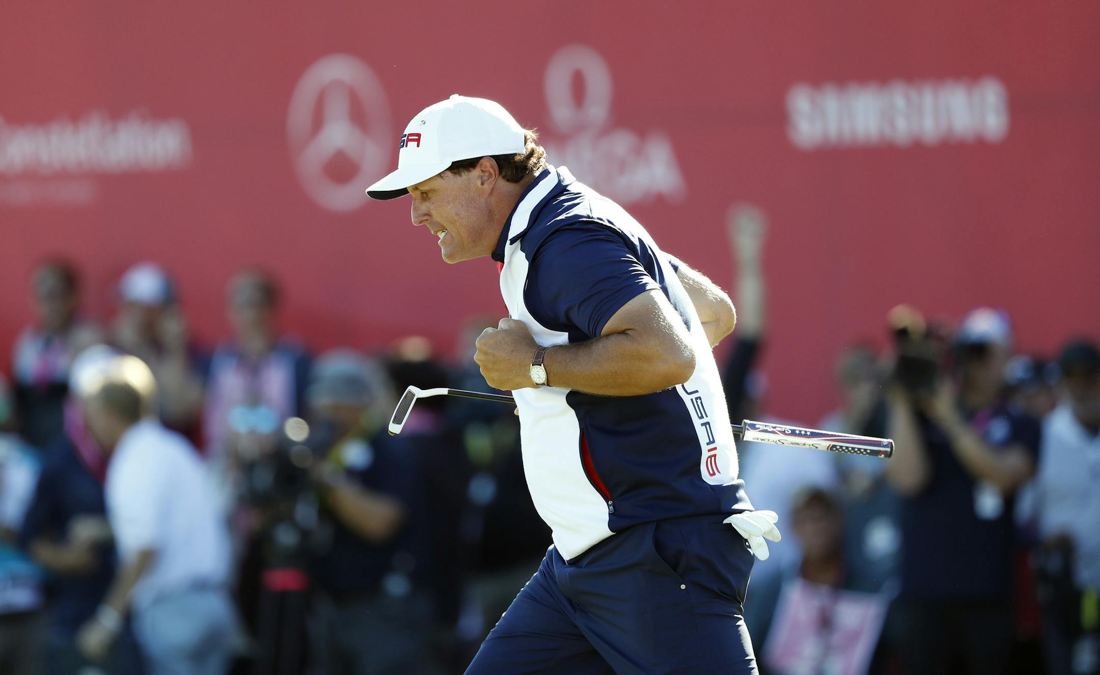 Phil Mickelson celebrated his putt on the 18 hole at Hazeltine National Golf Course Saturday October 2, 2016 in Chaska, MN. ] Final round of the the Ryder Cup at Hazeltine National Golf Course. Jerry Holt / jerry. Holt@Startribune.com