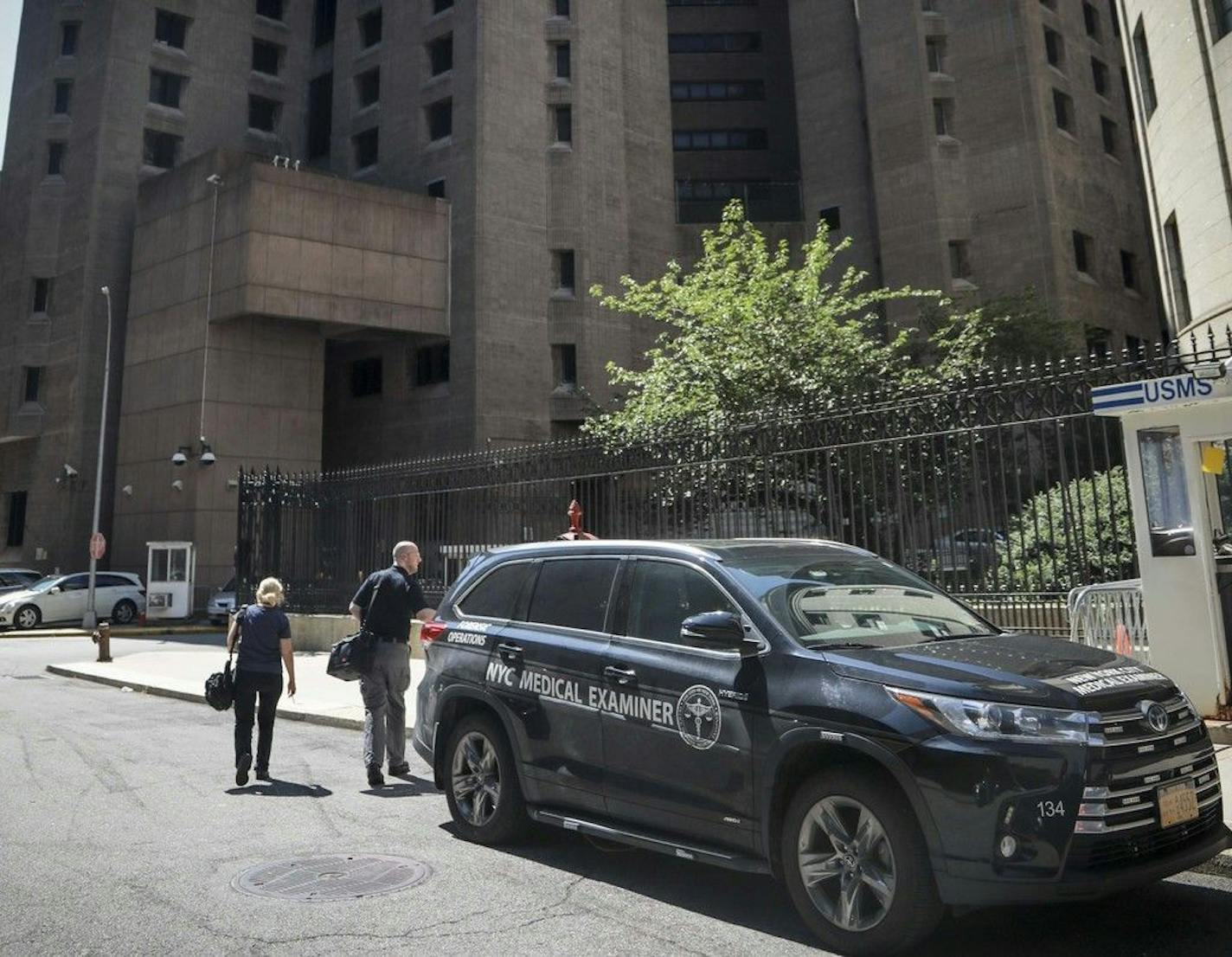 New York City medical examiner personnel leave their vehicle and walk to the Manhattan Correctional Center where financier Jeffrey Epstein died by suicide while awaiting trial on sex-trafficking charges, Saturday Aug. 10, 2019, in New York. He was found in his cell at the Manhattan Correctional Center Saturday morning, according to the officials, who was briefed on the matter but spoke on condition of anonymity because he wasn't authorized to discuss it publicly. The medical examiner's office in