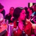 Bartender Keila Saucedo serves visitors as they mingle at The Eagle Creek Saloon," an art installation/bar that reimagines the San Francisco gay bar o