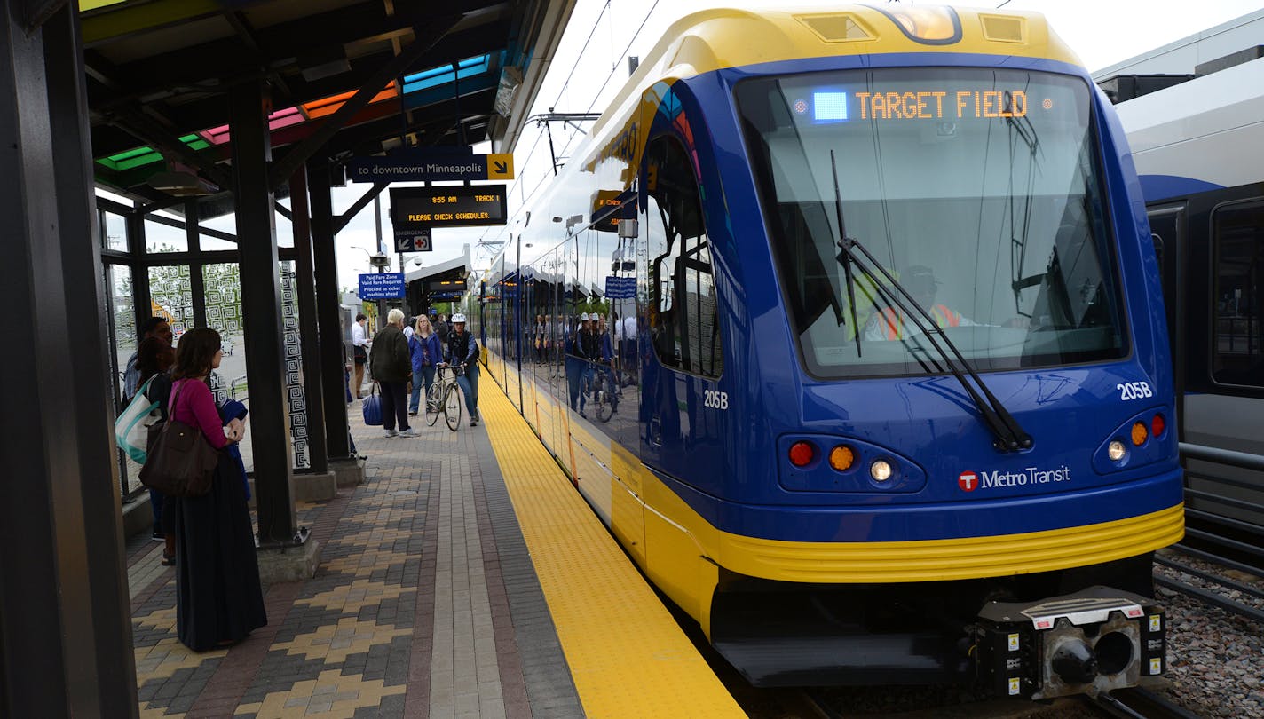 The Hiawatha Light Rail Line is being rebranded as the METRO Blue Line. The Blue Line is the first of the Twin Cities METRO system of rapid transit lines which include METRO Red Line Bus Rapid Transit on Cedar Ave. METRO Blue Line trains will now have three cars and will run every ten minutes throughout most of the day. Twelve new light-rail vehicles dedicated to the line will allow this increased service capacity. During the kickoff event Metro Transit staff handed out Blue line pens, new sched