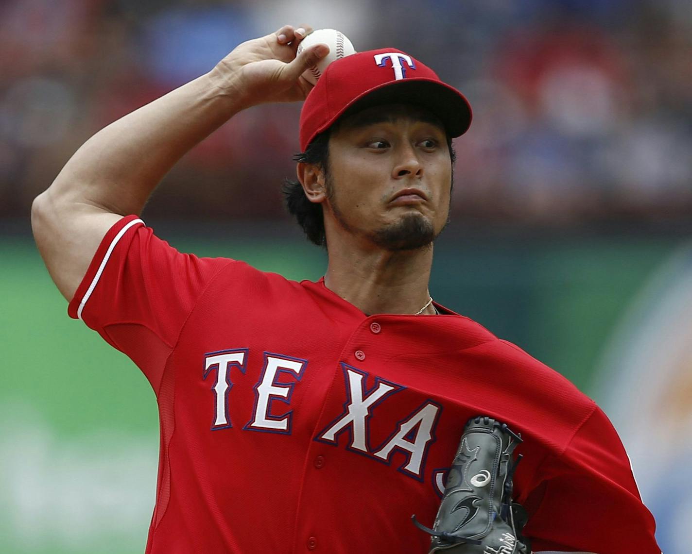 Texas Rangers starting pitcher Yu Darvish throws against the Minnesota Twins during the first inning on Saturday, June 28, 2014, at Globe Life Park in Arlington, Texas. (Jim Cowsert/Fort Worth Star-Telegram/MCT)