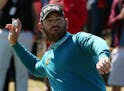 South Africa's Louis Oosthuizen celebrates after a hole in one on the 14th green during the first round of the British Open Golf Championship at the R