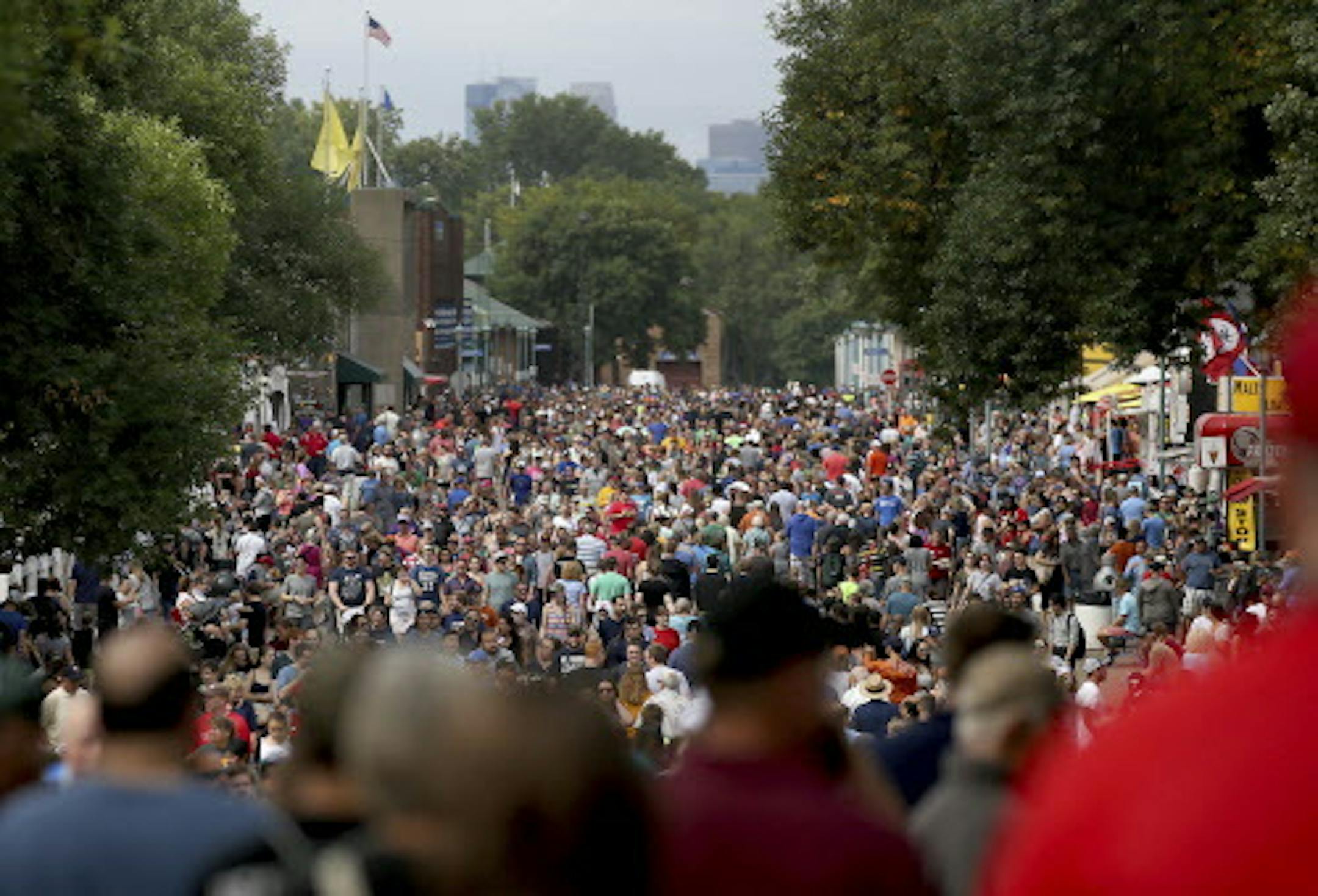 While the weather was cloudy and muggy, a decent crowd gathered for the last day of the Minnesota State Fair Monday, Sept. 3, 2018, in Falcon Heights, Minn. (David Joles /Star Tribune via AP)