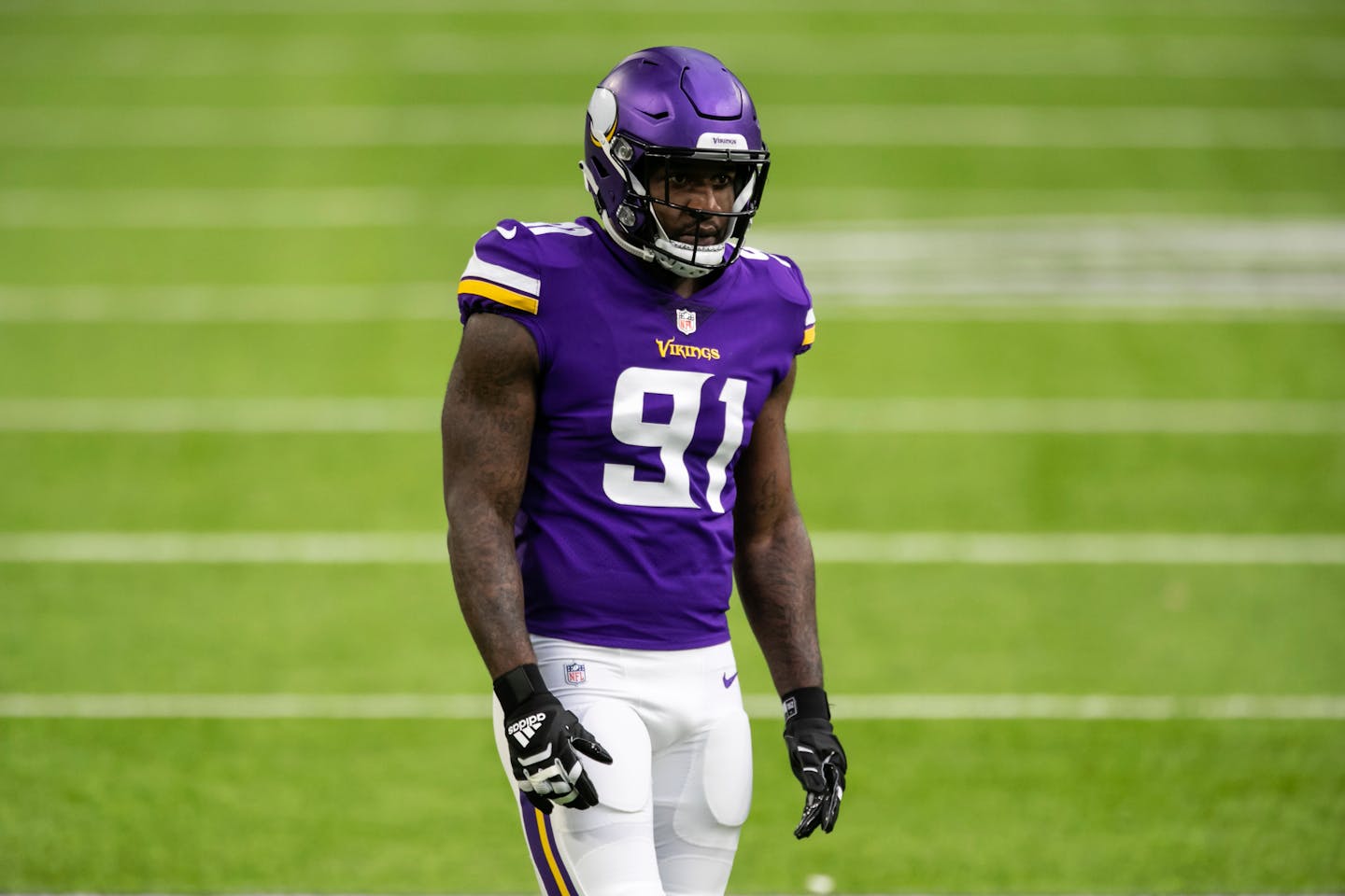 Minnesota Vikings defensive end Yannick Ngakoue (91) looks on in the first quarter during an NFL football game against the Atlanta Falcons, Sunday, Oct. 18, 2020, in Minneapolis. The Falcons defeated the Vikings 40-23. (AP Photo/David Berding)