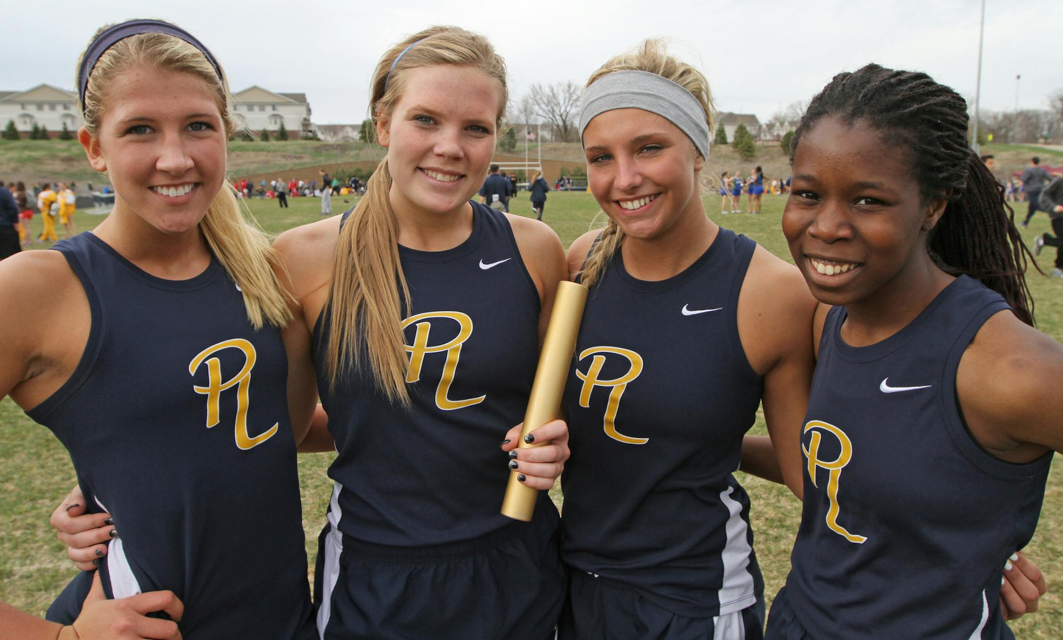 From left, Prior Lake 4x200 relay members Alex Collins, Leah Amundson, Sabrina Hille and Bolade Jinadu.