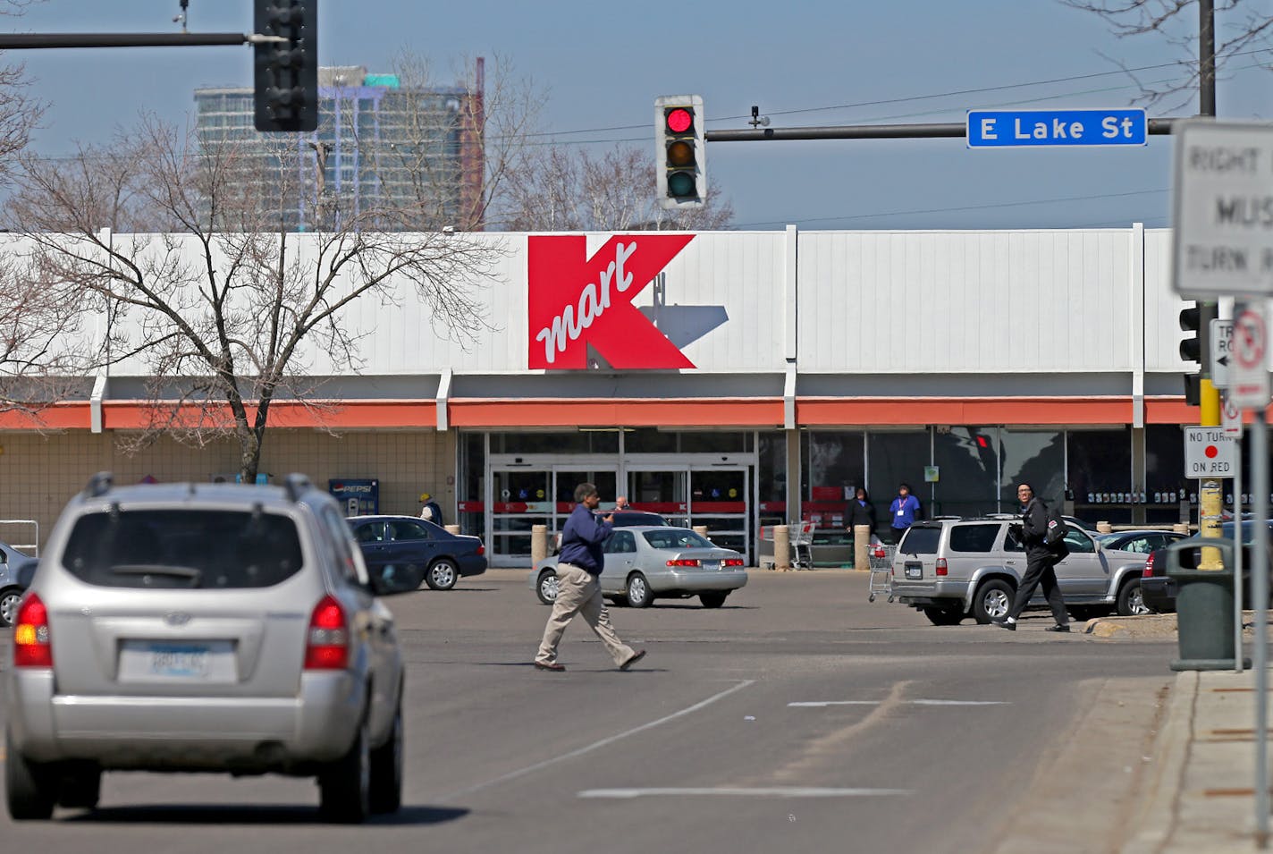 Pedestirans made their way to and near the Kmart near the corner of Nicollet and Lake Streets, Tuesday, April 15, 2014 in Minneapolis, MN. Minneapolis officials discussed Tuesday a redevelopment plan that would reverse one of the biggest planning blunders in city history: closing Nicollet Avenue at Lake Street. ] (ELIZABETH FLORES/STAR TRIBUNE) ELIZABETH FLORES &#x2022; eflores@startribune.com