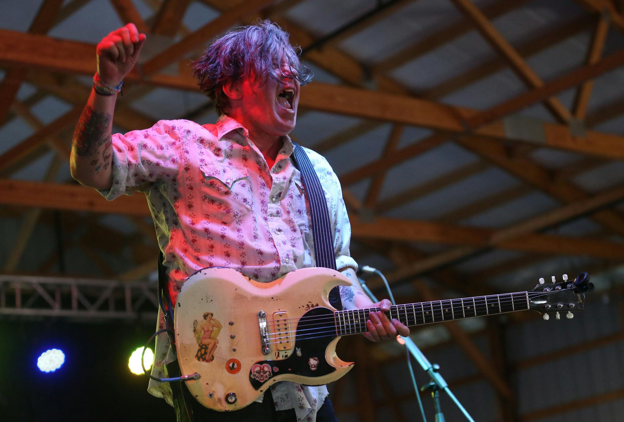 Robert Wilkinson, of the Flamin' Oh's, let out a yell as they performed on the Taste stage . ] (KYNDELL HARKNESS/STAR TRIBUNE) kyndell.harkness@startribune.com Taste of Minnesota in Waconia Min. Saturday, July 5, 2014.