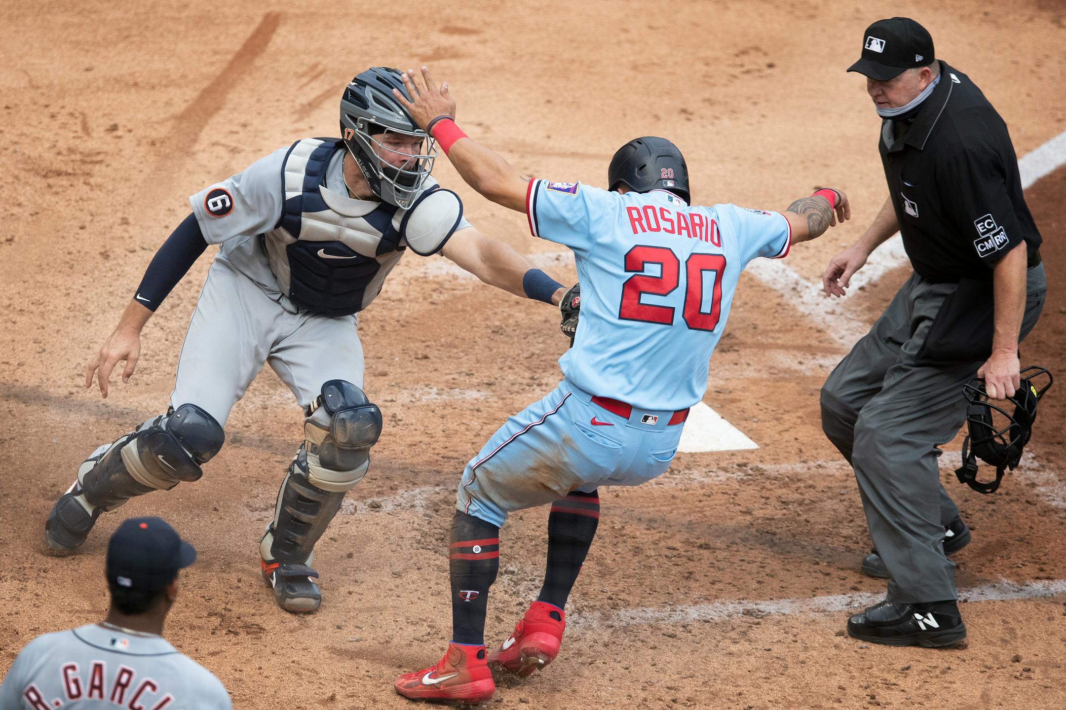 The Twins' Eddie Rosario was tagged out by Tigers catcher Grayson Greiner (17) in the fifth inning, trying to score on a bases-loaded double by Brent Rooker.
