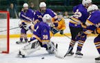 Chaska goalie Carter Wishart tracked the puck during the Hawks' 4-1 upset of top-seeded Prior Lake in the Class 2A, Section 6 semifinals on Saturday.