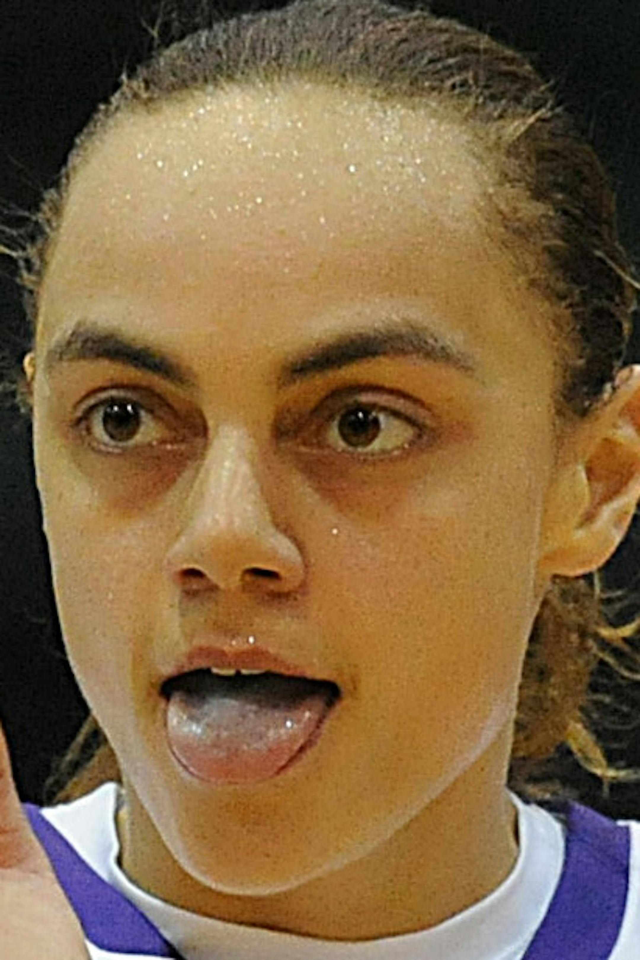 James Madison's Jazmon Gwathmey, right, cheers as Drexel's Sarah Curran walks past in the second half of an NCAA college basketball game in the championship of the Colonial Athletic Association women's tournament, Saturday, March 12, 2016, in Upper Marlboro, Md. James Madison won 60-46. (AP Photo/Gail Burton) ORG XMIT: MDGB113