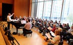 Jerry Rubino, Voices of Expression director, rehearse with members of the choir for an upcoming concert at the MacPhail Center for Music Tuesday, 26, 
