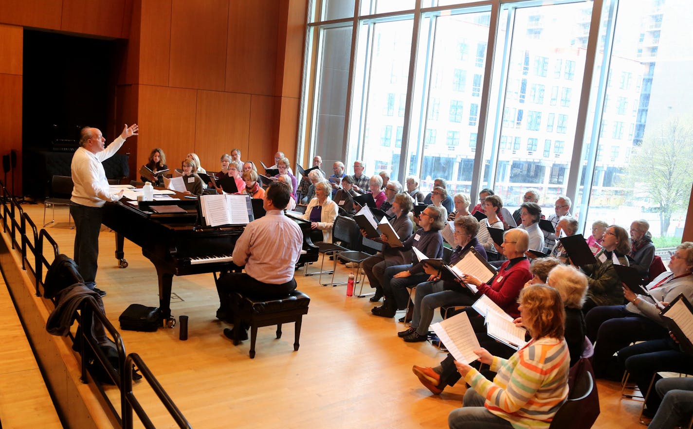 Jerry Rubino, Voices of Expression director, rehearse with members of the choir for an upcoming concert at the MacPhail Center for Music Tuesday, 26, 2016, in Minneapolis, MN.](DAVID JOLES/STARTRIBUNE)djoles@startribune.com Voices of Experience, a chorus that's part of a senior music education program at MacPhail Center. Center is teaming up with developer of senior housing to create more arts experiences for retirees.**Jerry Rubino,cq