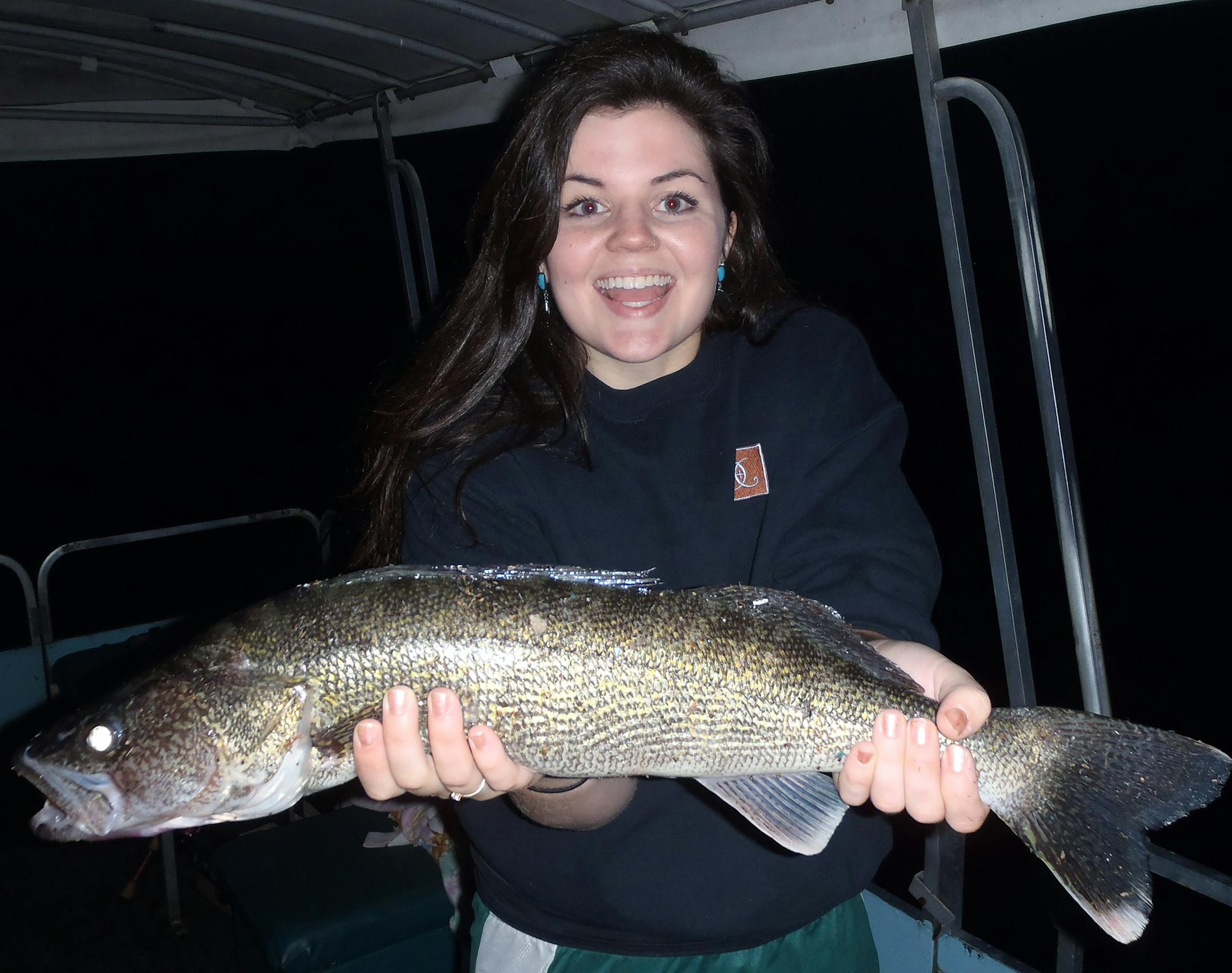 Donyal Eret of Chisago City caught this 23-plus-inch walleye on Chisago Lake recently while fishing with her brother Tom and his fiance. It was getting dark when Tom said "one more cast," and Eret hooked this dandy.