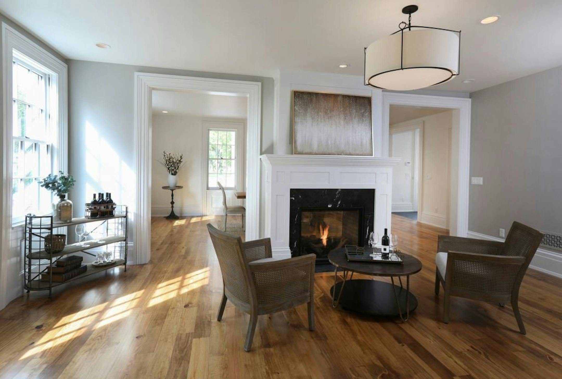 The two-sided fireplace also faces the family room.
