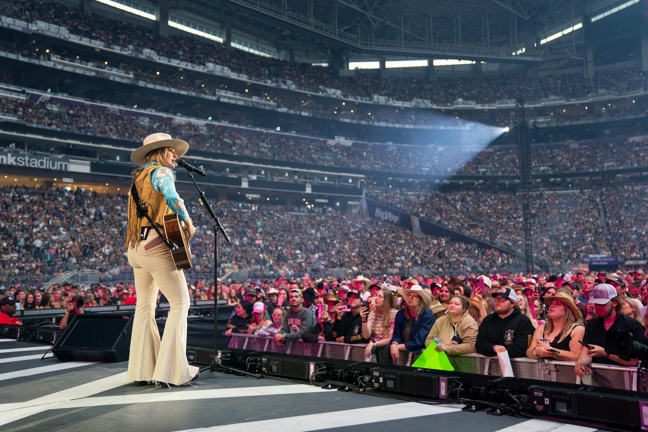 Lainey Wilson opened for Luke Combs at U.S. Bank Stadium.