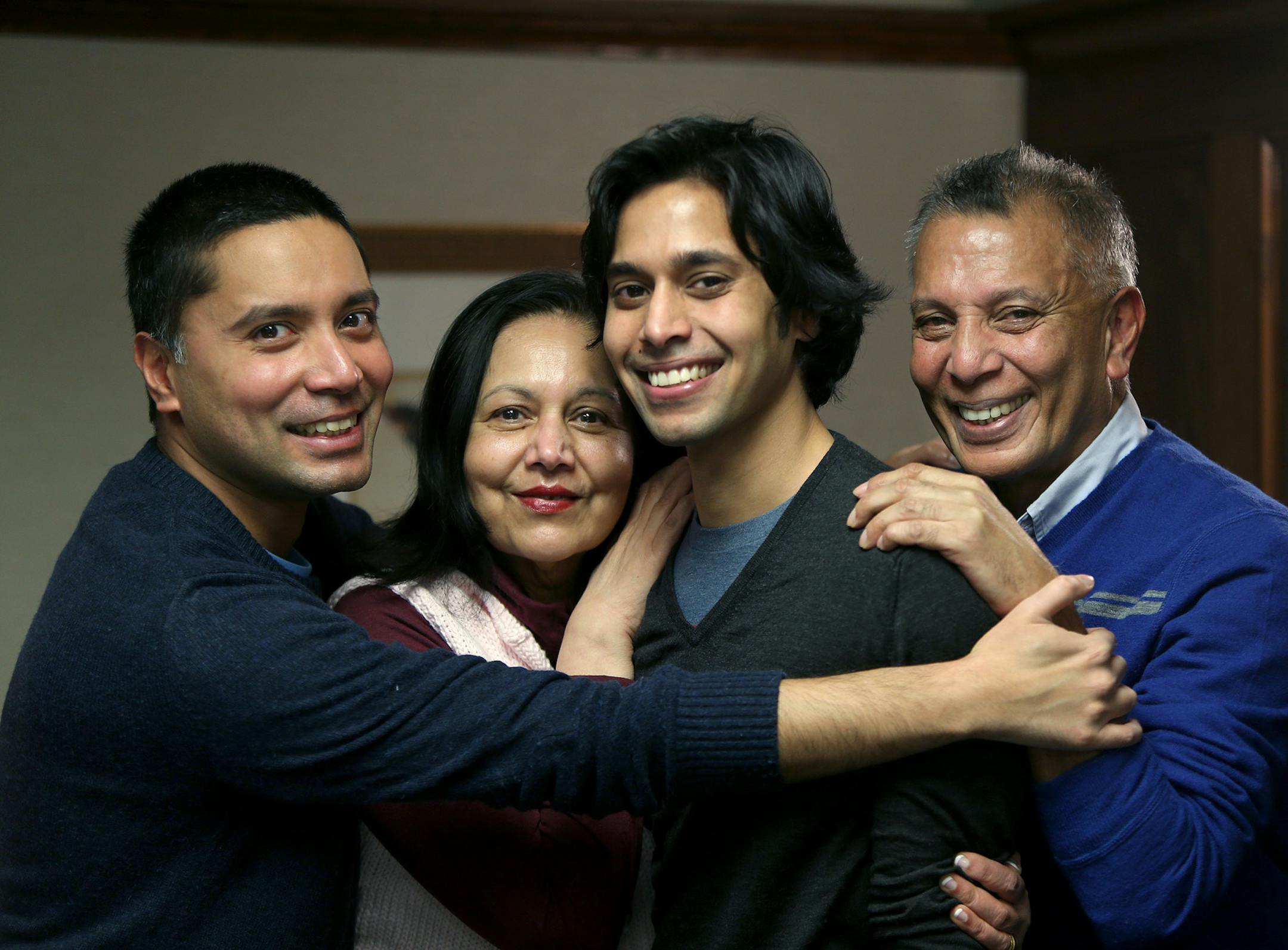 Shezanne "Shez" Cassim's family including from left, brother Shervon, mother Jean, and father Sanath, said they were keeping him close during a recent interview, Tuesday, January 14, 2014. Cassim recently returned to the U.S. after spending nine months in a United Arab Emirates prison for producing an online comedy video that authorities didn't like.