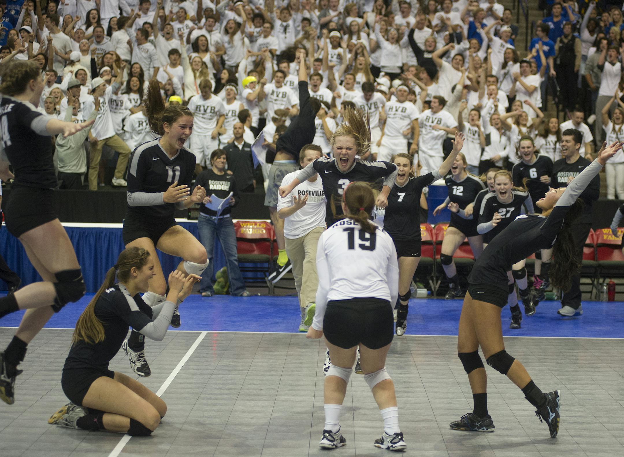 After five close matches, the Roseville Area girls volleyball team rushes the floor to celebrate a victory in the Class 3A volleyball state quarterfinals over Champlin Park, Thursday, November 6th, 2014 at the Xcel Energy Center in St. Paul, MN. ] (Matthew Hintz, 110614, St. Paul)