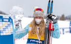 Jessie Diggins poses as first placed of the Overall FIS Cross Country World Cup in S-Chanf, Switzerland, on Sunday, March 14, 2021.