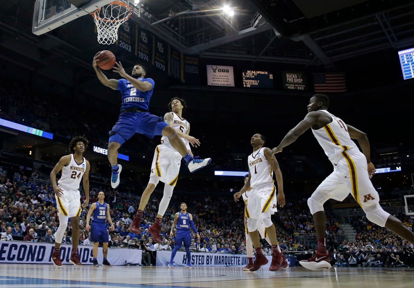 Middle Tennessee State's Antwain Johnson goes up for a shot during the first half of an NCAA college basketball tournament first round game against Minnesota Thursday, March 16, 2017, in Milwaukee. (AP Photo/Kiichiro Sato)