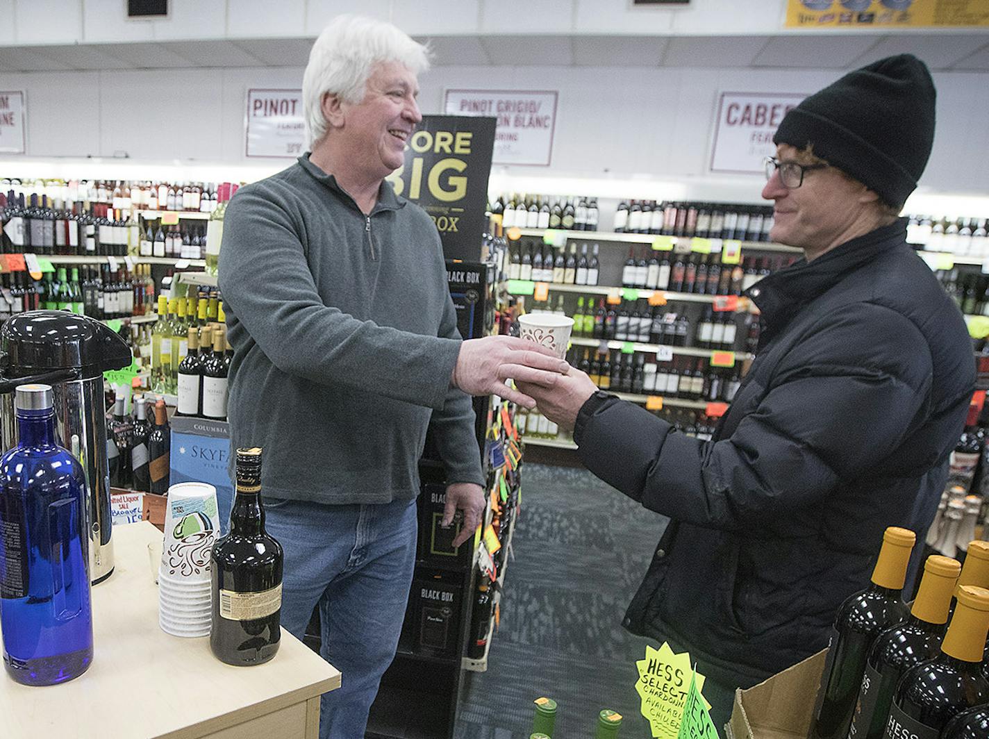 United Liquors manager Dan Condon handed out coffee with Irish cream to customers during its weekly "Sunday Funday" to try to get more people to the store, Sunday, January 14, 2018 in Bloomington, MN. ] ELIZABETH FLORES &#xef; liz.flores@startribune.com