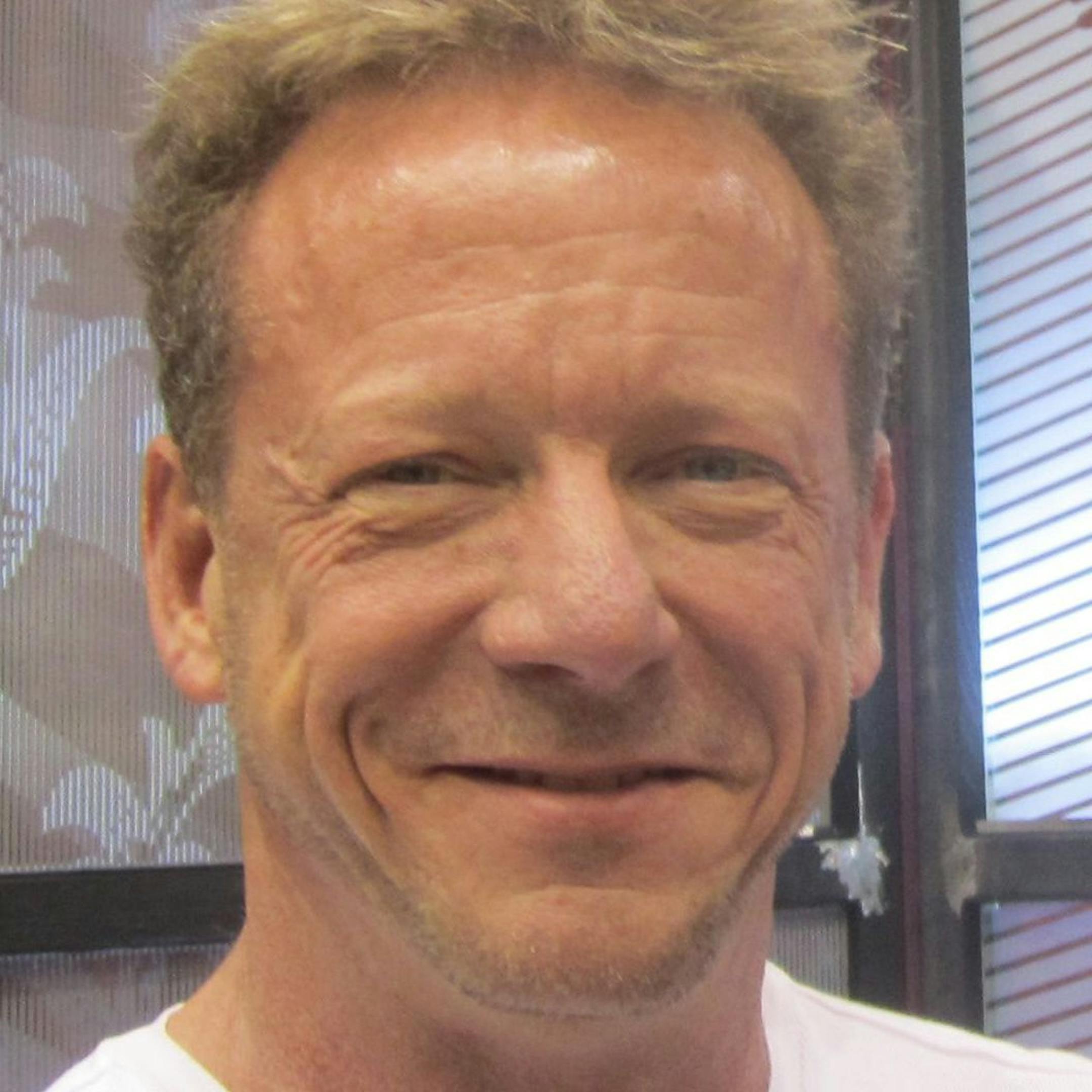 Blasted Art Inc. owner Kerry Dikken with his 10-foot work of art immortalizing Vikings punter Chris Kluwe. ORG XMIT: MIN1211071658228113