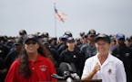 Jennifer Appel, right, and Tasha Fuiava speak on the deck of the USS Ashland at White Beach Naval Facility in Okinawa, Japan Monday, Oct. 30, 2017. Th