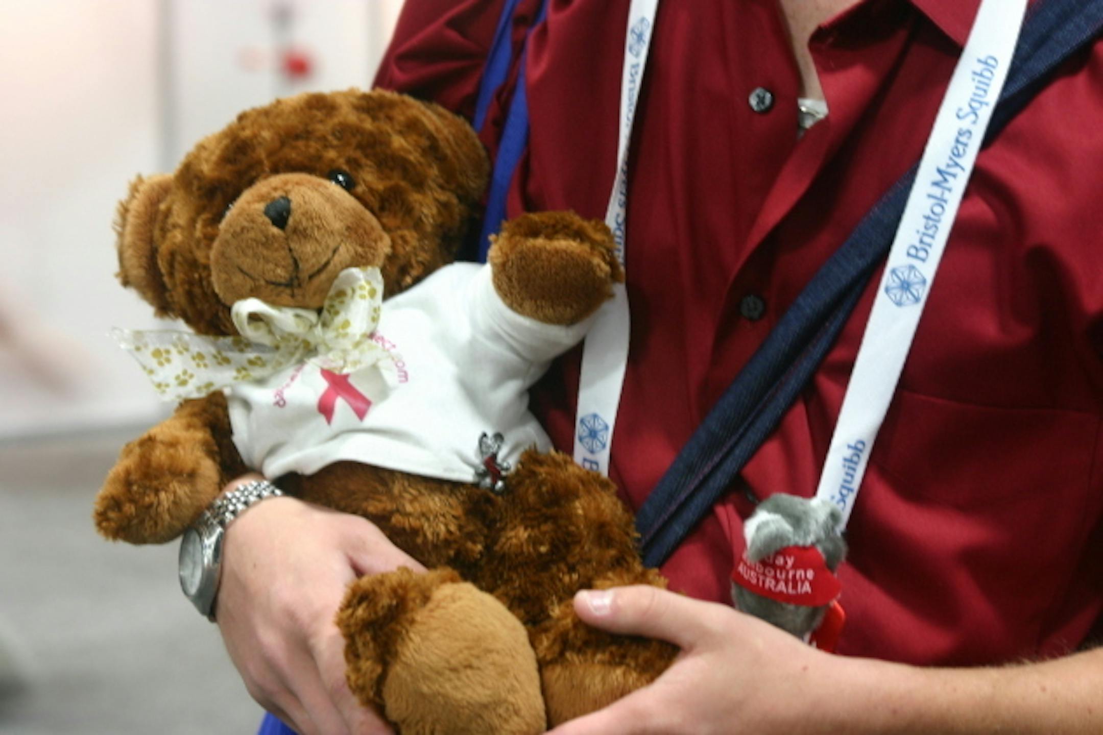 Ambassador of Hope Eric Hill holds Dab, the AIDS bear. Daniela Hernandez.
