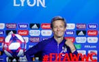 United States' Megan Rapinoe attends a press conference at the Stade de Lyon, outside Lyon, France, Saturday, July 6, 2019. US will face Netherlands i