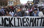 Protesters walked along Washington Avenue during a Black Lives Matter rally on Wednesday, April 29, 2015, in Minneapolis, Minn. ] RENEE JONES SCHNEIDE