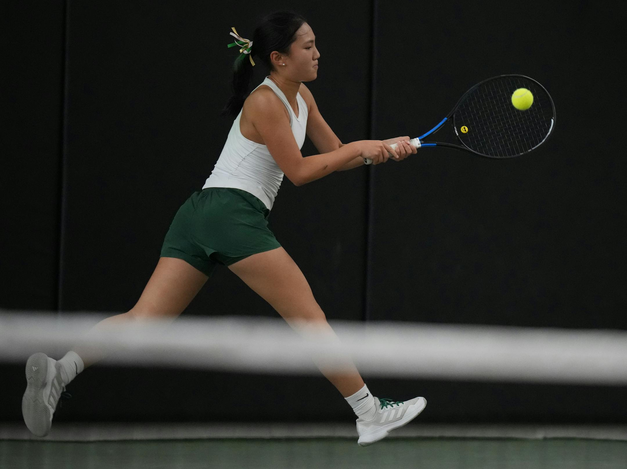 Raya Hou of Edina returns a volley from Malea Diehn of Mayo who goes on to win the match at the Baseline Tennis Center in Minneapolis, Minnesota on Wednesday, Oct. 25, 2023.